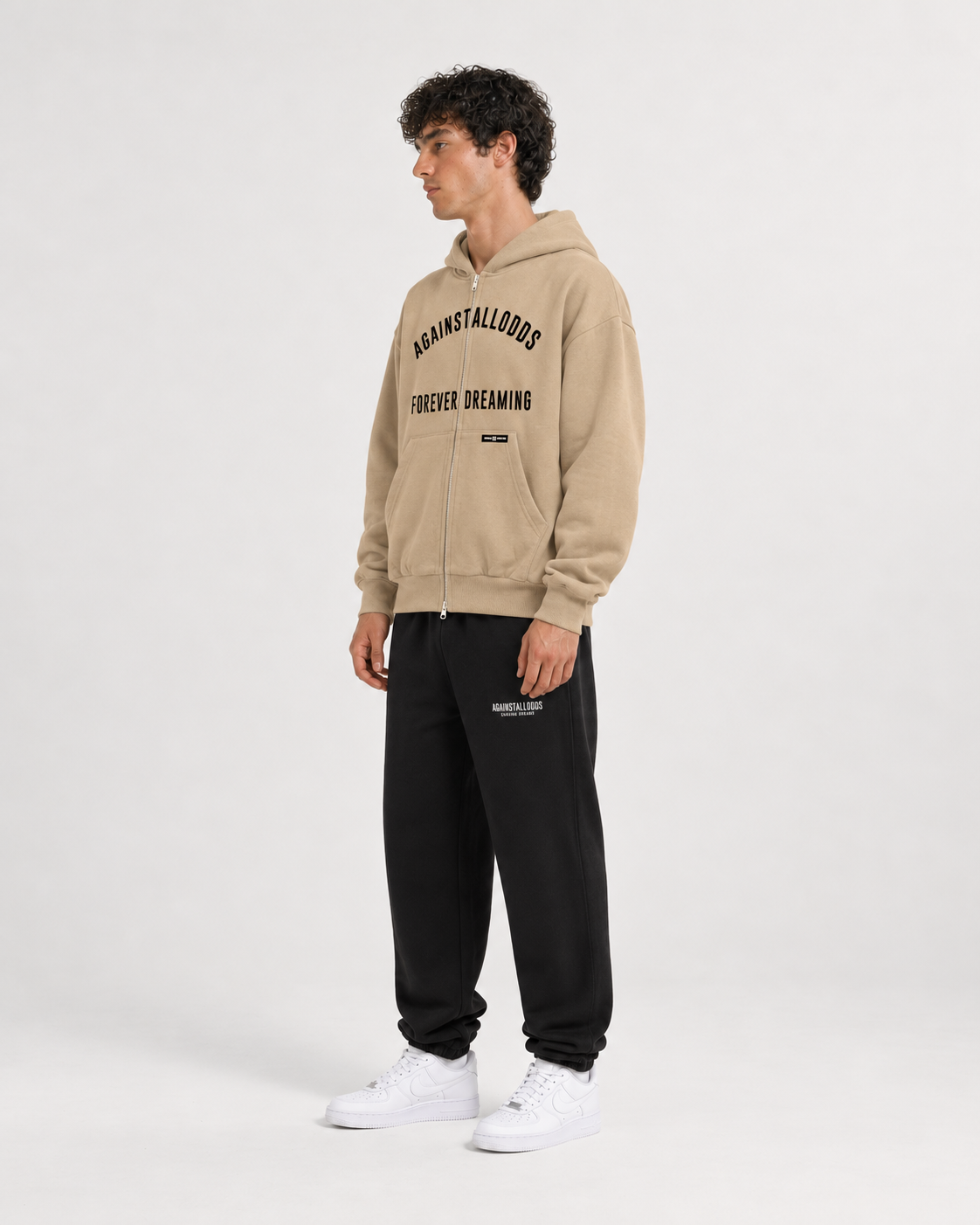 AI-generated styling illustration: College Coffee Double Zip Luxury Hoodie with AAO black sweatpants, side view.