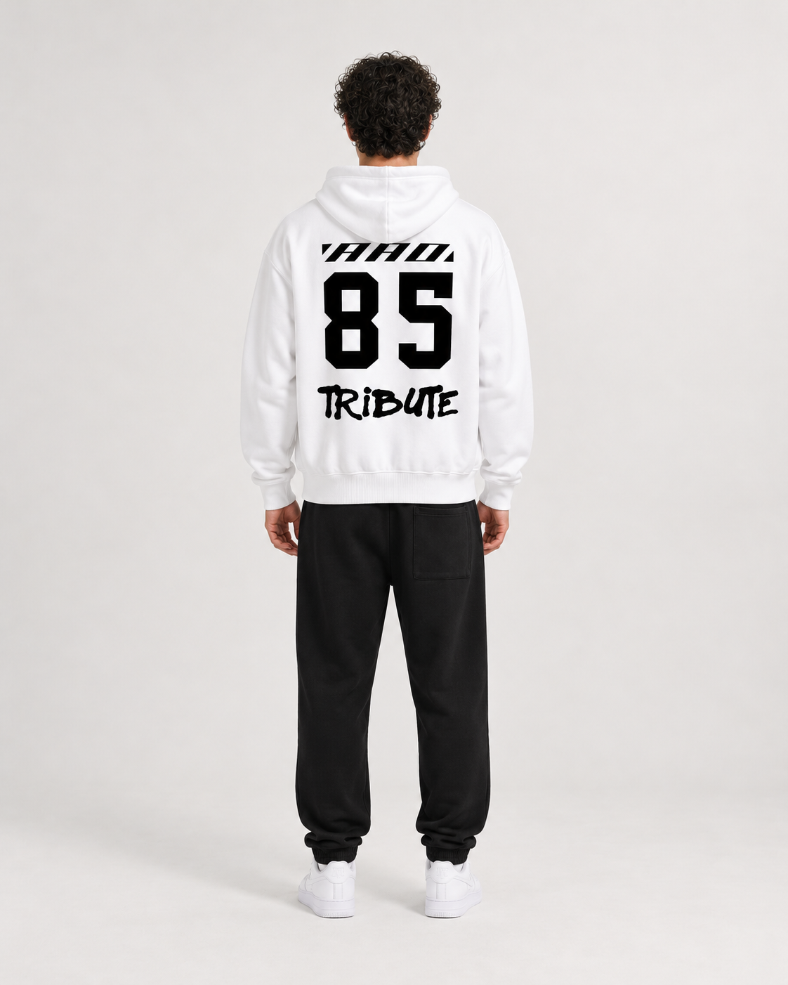 AI-generated styling illustration: AAO 85 white hoodie with AAO black sweatpants, back view.