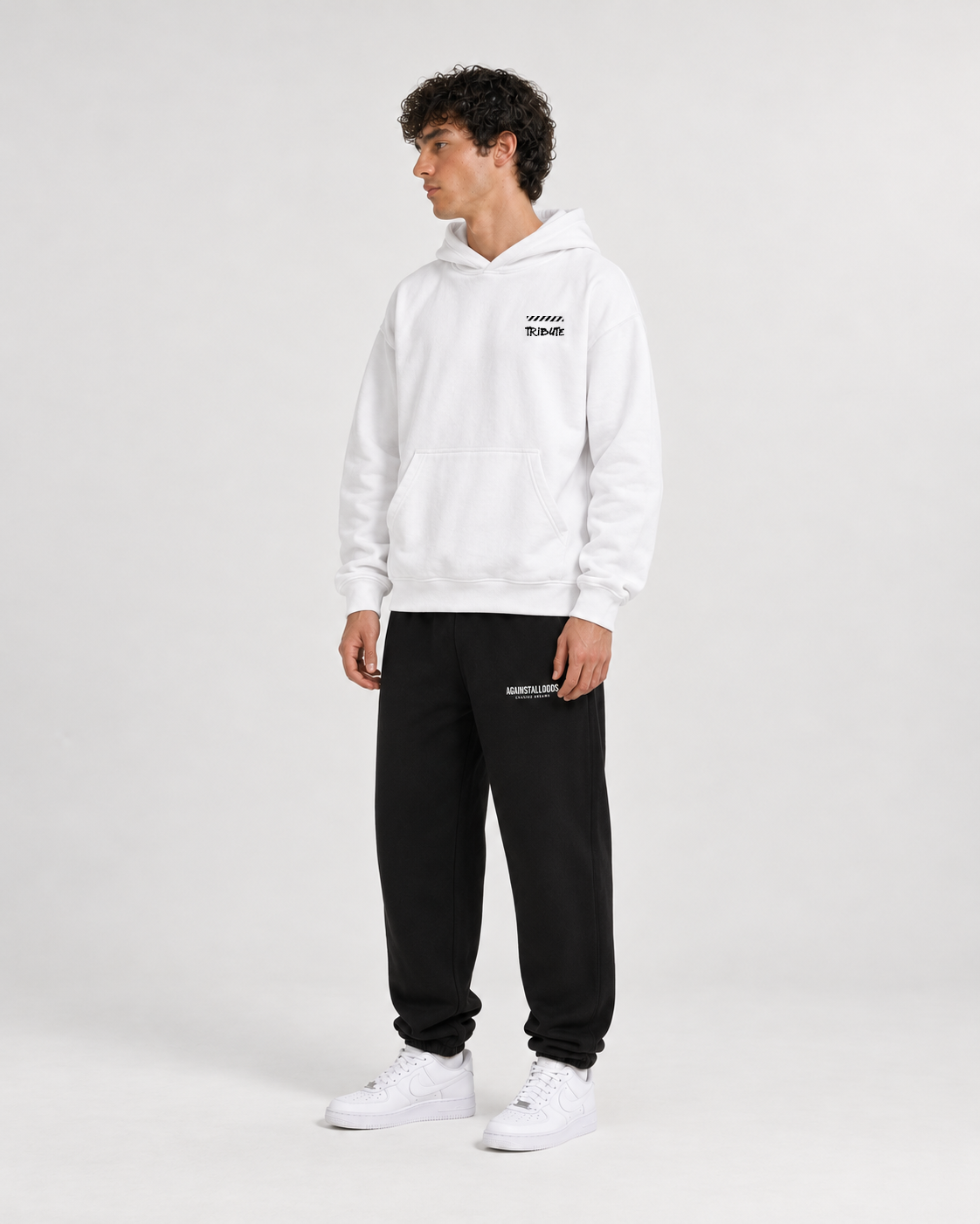 AI-generated styling illustration: AAO 85 white hoodie with AAO black sweatpants, front view.