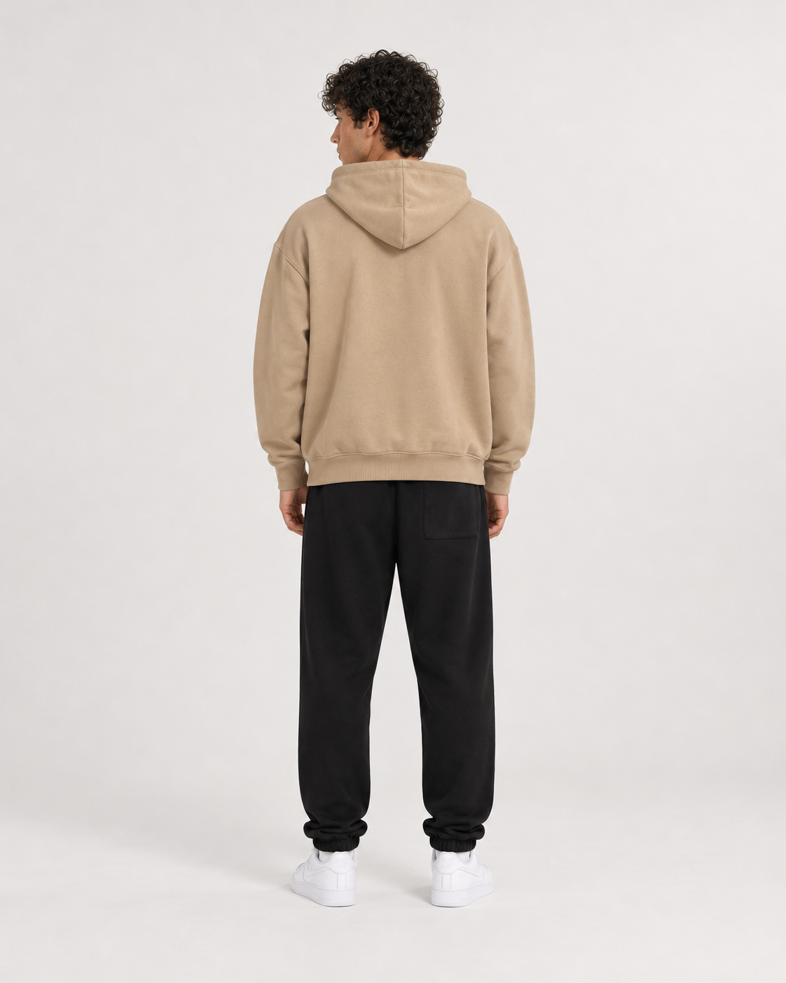 AI-generated styling illustration: College Coffee Double Zip Luxury Hoodie with AAO black sweatpants, back view.
