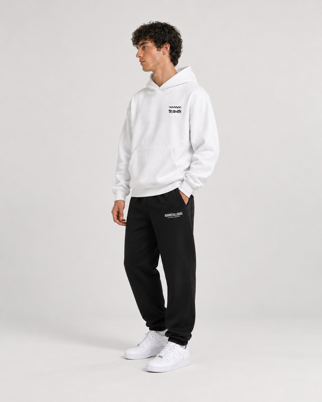 AI-generated styling illustration: AAO 85 white hoodie with AAO black sweatpants, side view.